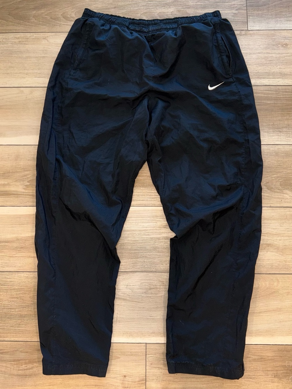 Nike Black Jogger-Style Sweatpants with White Swoosh